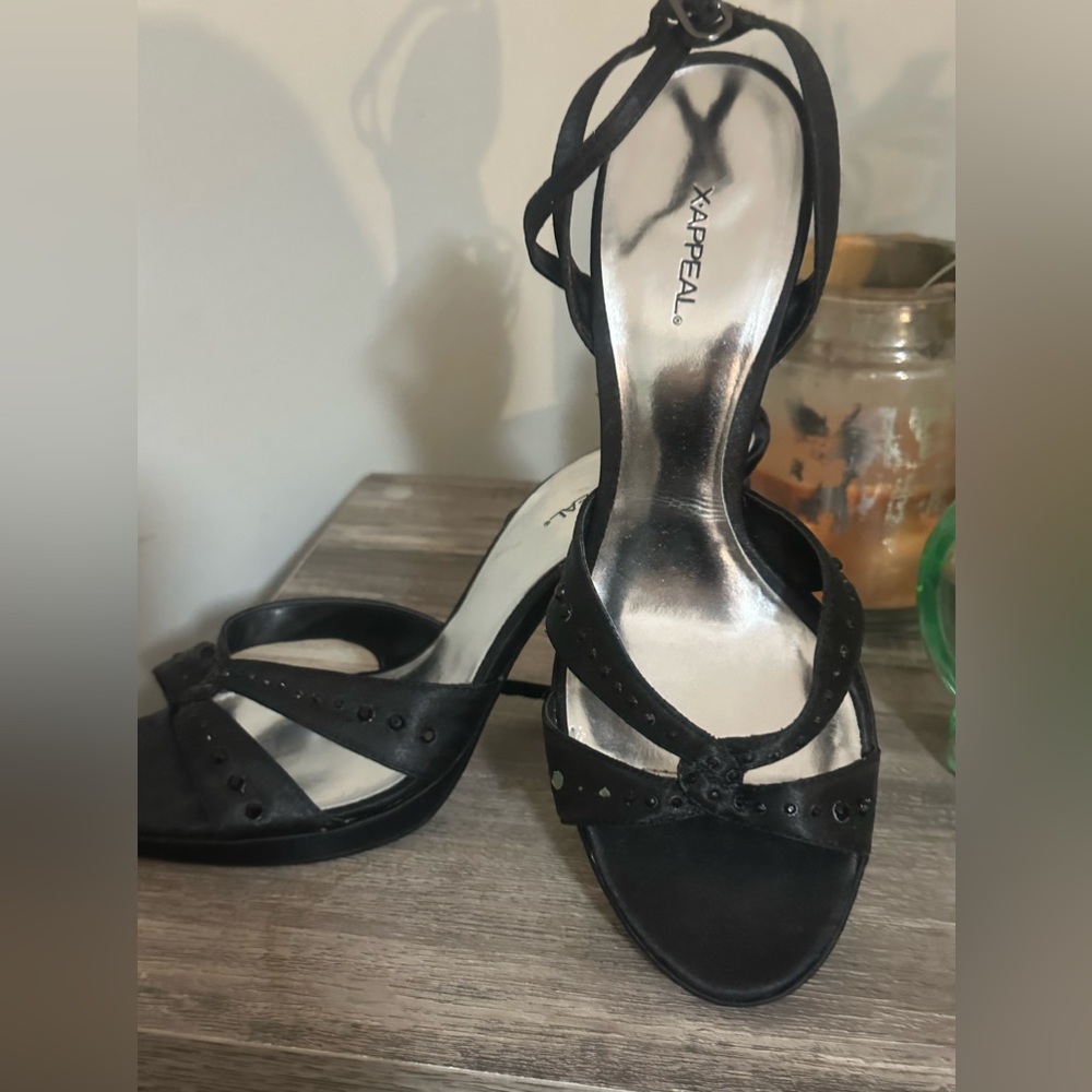 Size 8 1/2 xAppeal black strappy heals only worn a couple of times